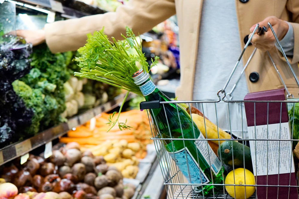 Grocery shopper examining ingredients